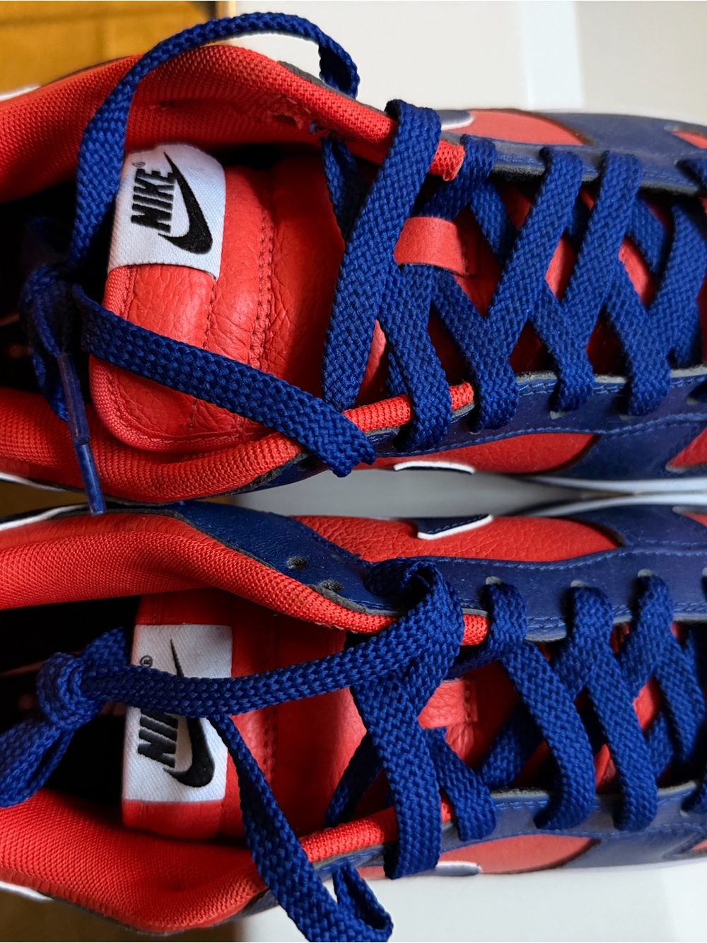 Nike Men’s Red and Blue Low-Top Sneakers with White Swoosh